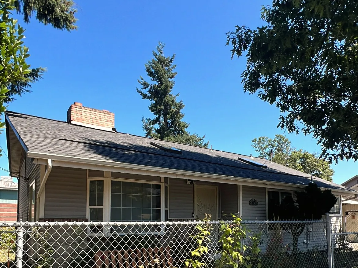 A completed AHX roof replacement with new architectural shingles